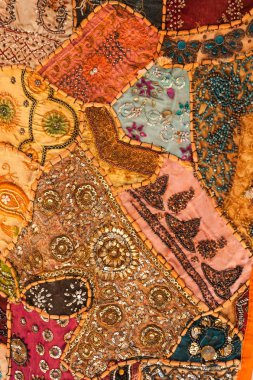 Boncuk ile renkli patchwork halı. Arka plan, doku.