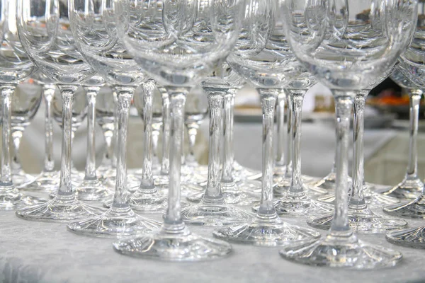 Empty glasses on the table in a large hangar