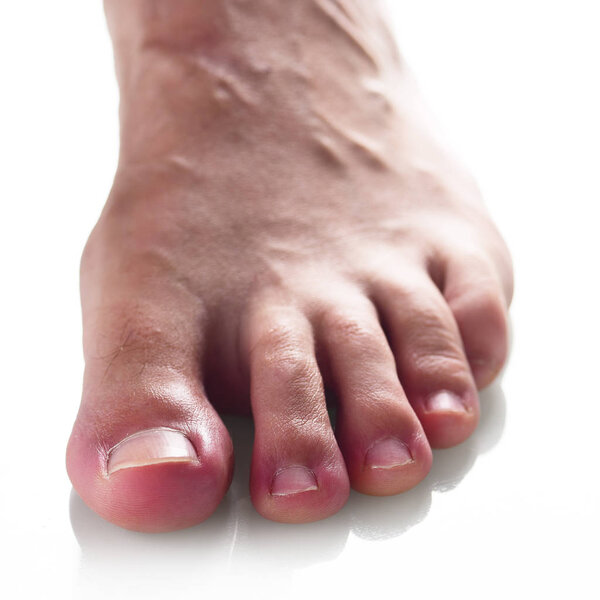 Close view of male foot isolated on white background