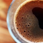 Cup of coffee on wooden table