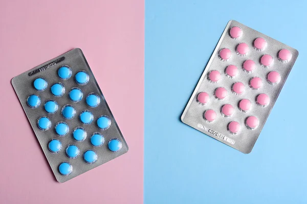 Comprimidos Rosa Azul Sobre Fondo Pastel Con Espacio Para Copiar —  Fotos de Stock