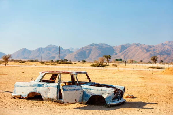Abandoned old car near a service station at Solitaire in Namibia