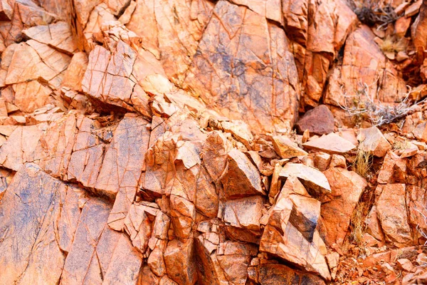 赤い岩の自然な背景がクローズアップ — ストック写真