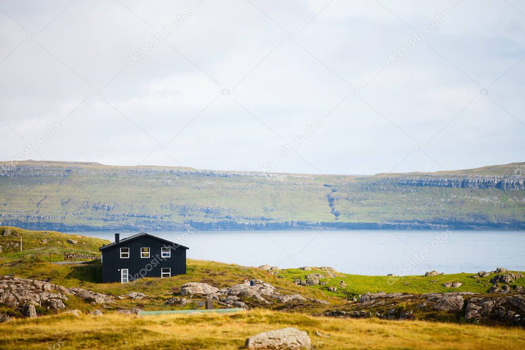 Beautiful scenery of Faroe islands landscape with old farm houses