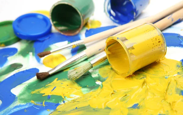 blue, yellow and green paint for drawing