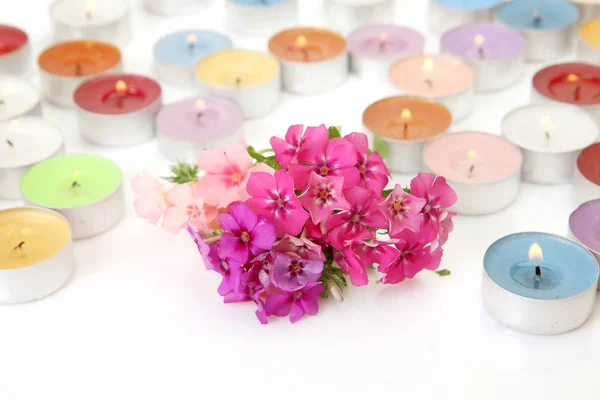 Beautiful Flowers Burning Candles Stock Image