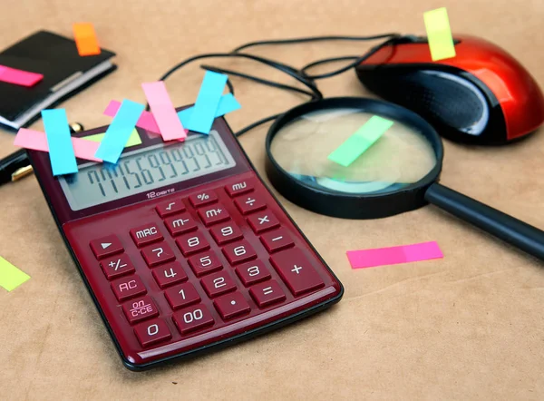 calculator, computer mouse and other office supplies