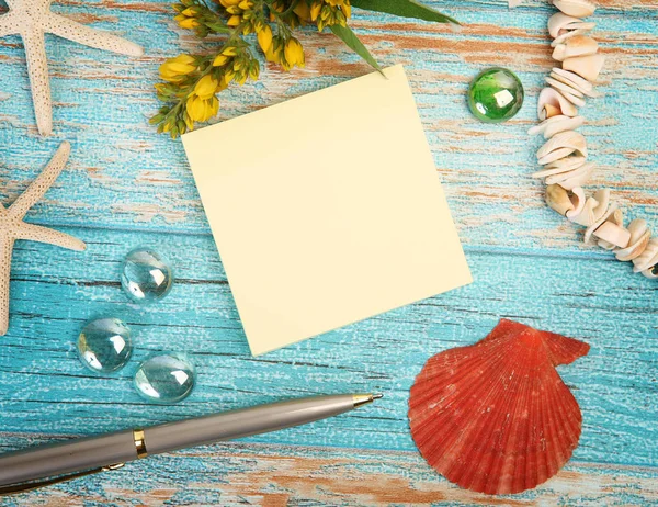 Sheet Paper Flowers Beads Seashells Blue Background — Stock Photo, Image
