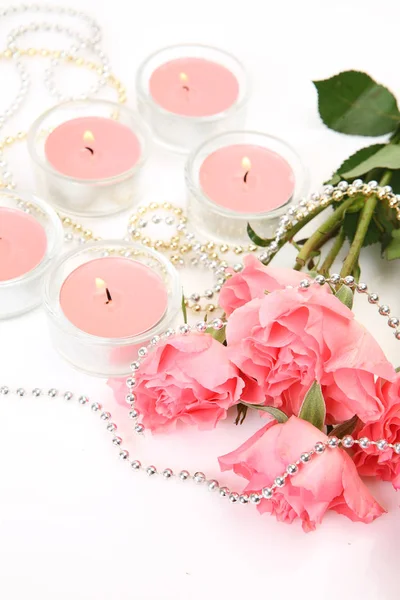 Bouquet Pink Roses Burning Candles White Background — Stock Photo, Image