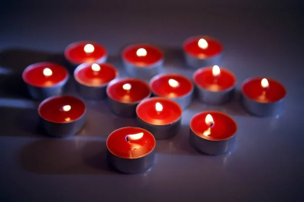 Candles burning in the dark — Stock Photo, Image