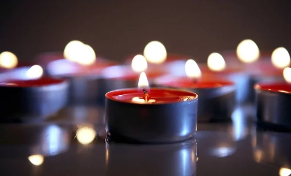 Candles burning in the dark — Stock Photo, Image