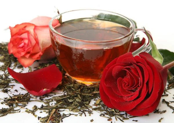 Tea in a mug and a rose — Stock Photo, Image