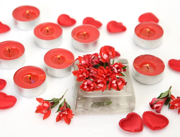 Red Flowers Ice Cube Hearts Red Burning Candles White Background — Stock Photo, Image