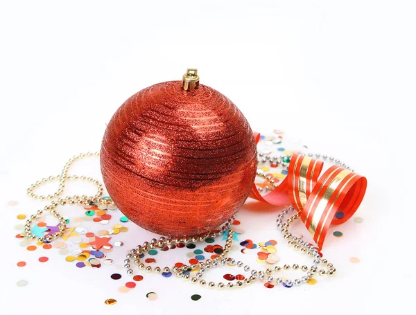 Colored serpentine and red ball — Stock Photo, Image