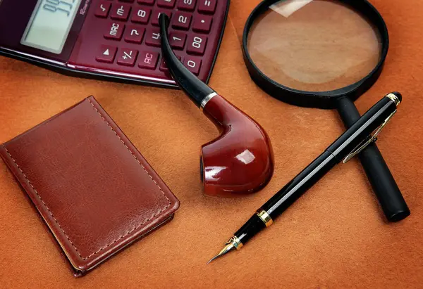 Smoking pipe, notebook and pen — Stock Photo, Image
