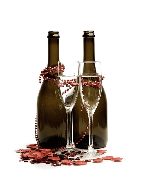酒瓶和节日装饰 免版税图库照片