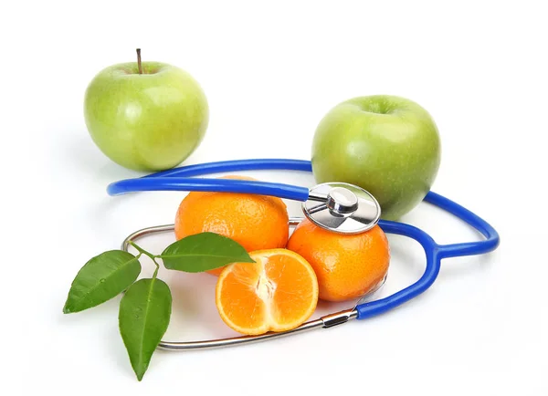 Green apple and pills for treating a disease — Stock Photo, Image