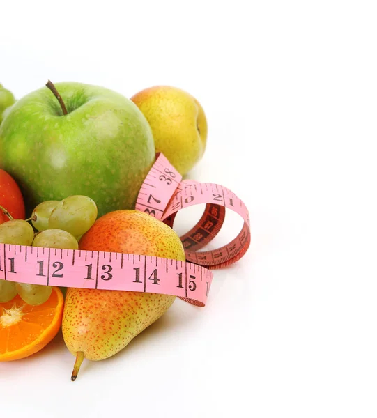 Fruta madura para alimentos dietéticos e fita métrica — Fotografia de Stock