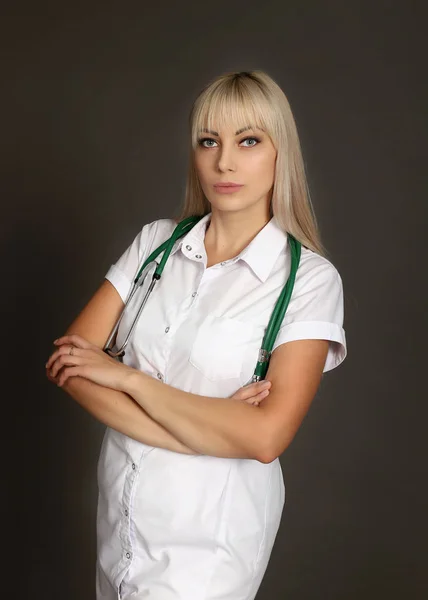 Female doctor in white coat Royalty Free Stock Photos