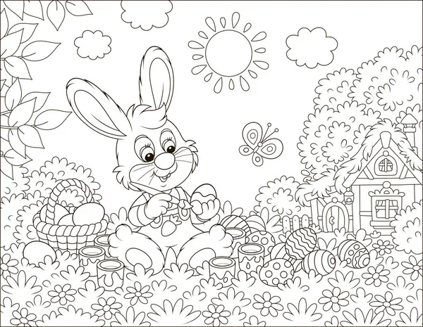 小兔子画复活节彩蛋在草地上的花在它的前面草坪附近的一个小木屋与茅草屋顶在一个阳光明媚的春天天 黑色和白色的矢量插图在卡通风格 — 图库矢量图片
