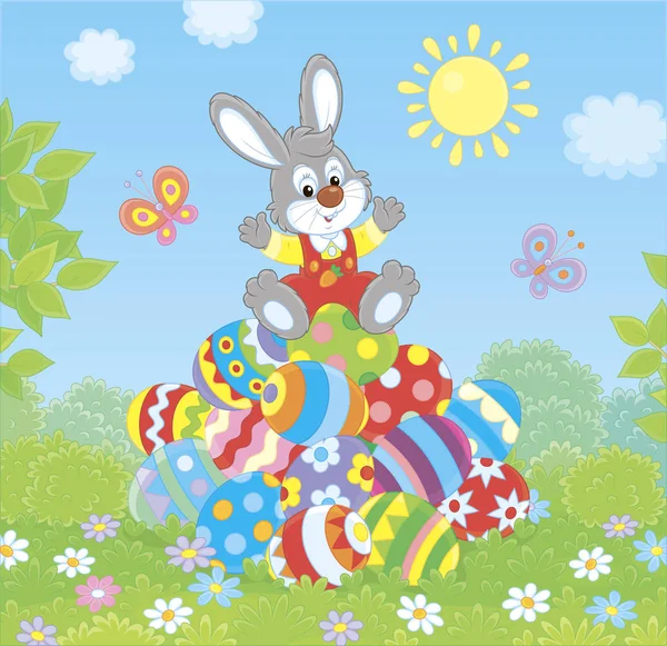 Petit Lapin Pâques Sur Une Pile Œufs Colorés Décorés Sur — Image vectorielle