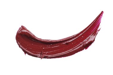 Dudak parlatıcısı beyaz arka plan üzerinde izole kırmızı makyaj smear. Beyaz arka plan üzerinde izole kırmızı ruj doku. Doku kırık kırmızı ruj