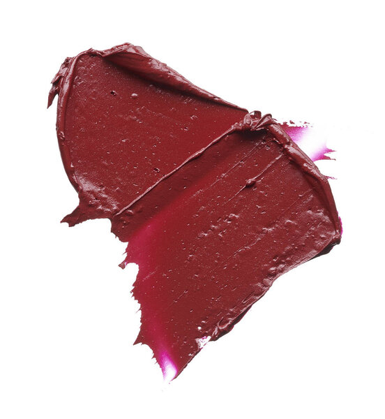 Red makeup smear of lip gloss isolated on white background. Red lipstick texture isolated on white background. Texture of broken red lipstick