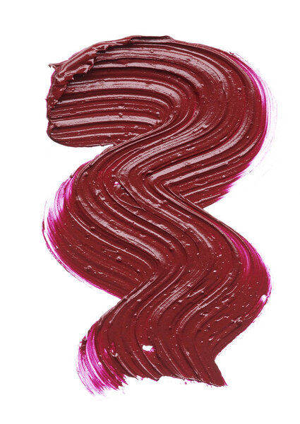 Red makeup smear of lip gloss isolated on white background. Red lipstick texture isolated on white background. Texture of broken red lipstick