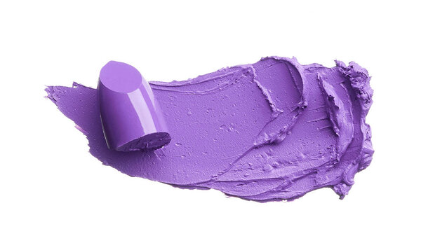 Purple makeup smear of lip gloss isolated on white background. Purple lipstick texture isolated on white background. Broken purple lipstick