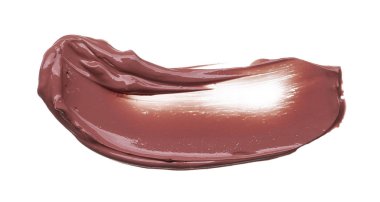 Doku beyaz arka plan üzerinde izole kahverengi ruj. Smear kırık kahverengi dudak parlatıcısı veya krem göz farı beyaz bir arka plan üzerinde izole. Beyaz izole kahverengi krem Vakfı doku