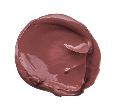 Doku beyaz arka plan üzerinde izole kahverengi ruj. Smear kırık kahverengi dudak parlatıcısı veya krem göz farı beyaz bir arka plan üzerinde izole. Beyaz izole kahverengi krem Vakfı doku