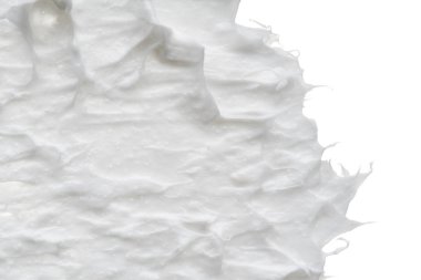 Beyaz? reamy doku beyaz arka plan üzerinde izole. Beyaz arka plan üzerinde yüz kremi smear