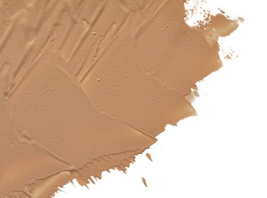 Beyaz arka plan üzerinde izole kremsi Vakfı'nın hafif bej makyaj karalama. Beyaz arka plan üzerinde izole hafif bej kremsi Vakfı doku