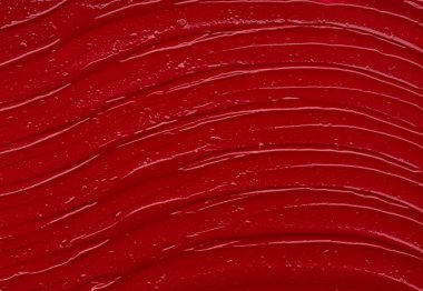 Mat ruj beyaz arka plan üzerinde izole kırmızı makyaj smear. Beyaz arka plan üzerinde izole kırmızı krem ruj doku