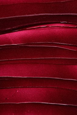 Mat ruj beyaz arka plan üzerinde izole kırmızı makyaj smear. Beyaz arka plan üzerinde izole kırmızı krem ruj doku