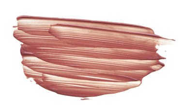 Beyaz arka plan üzerinde izole kremsi Vakfı'nın hafif bej makyaj karalama. Beyaz zemin üzerine altın kremsi lipgloss doku