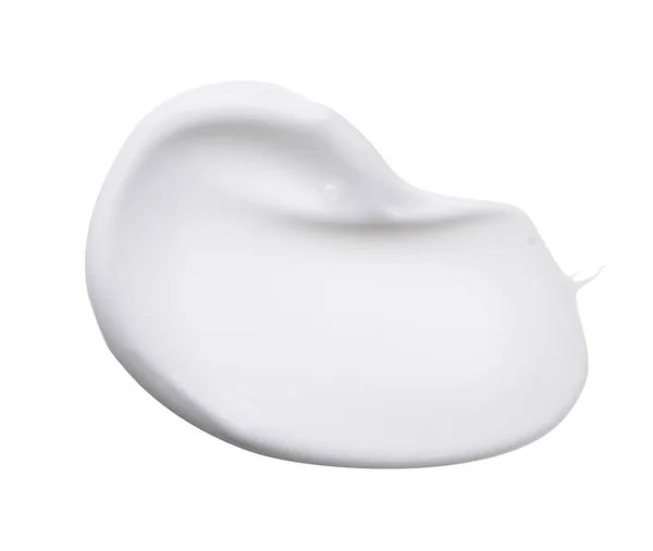 Beyaz smear kozmetik krem beyaz arka plan üzerinde izole. Kremsi Vakfı doku izole. İzole beyaz yüz krem sürün. Doku krem