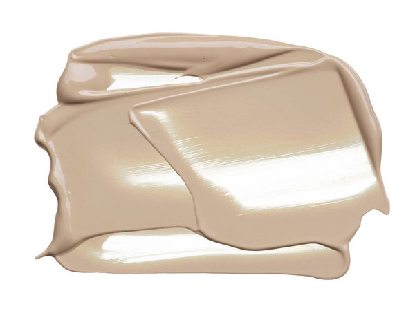 Light beige makeup smear of creamy foundation isolated on white background. Light beige creamy foundation texture isolated on white background