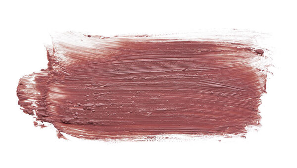 Texture of brown lipstick isolated on white background. Smear of broken brown lip gloss or creamy eye shadow isolated on a white background. Brown creamy foundation texture isolated on white
