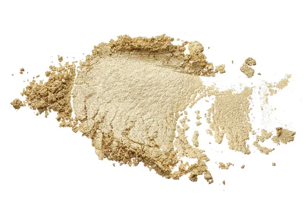 Crushed texture of beige eye shadow isolated on white background. Texture of broken golden powder on white background