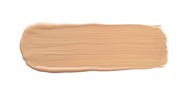 Light beige makeup smear of creamy foundation isolated on white background. Light beige creamy foundation texture isolated on white background