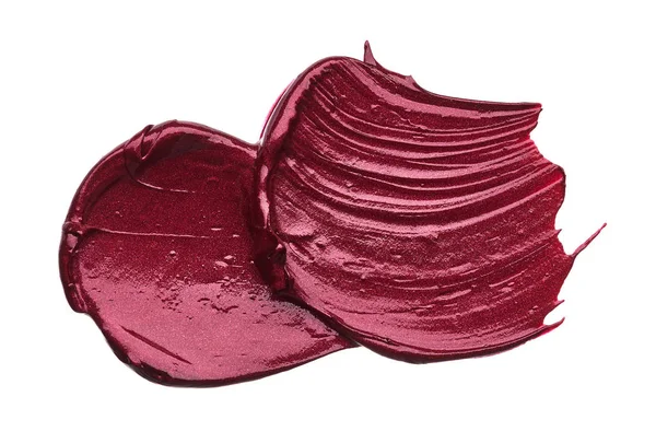 Mat ruj beyaz arka plan üzerinde izole kırmızı makyaj smear. Beyaz arka plan üzerinde izole kırmızı krem ruj doku