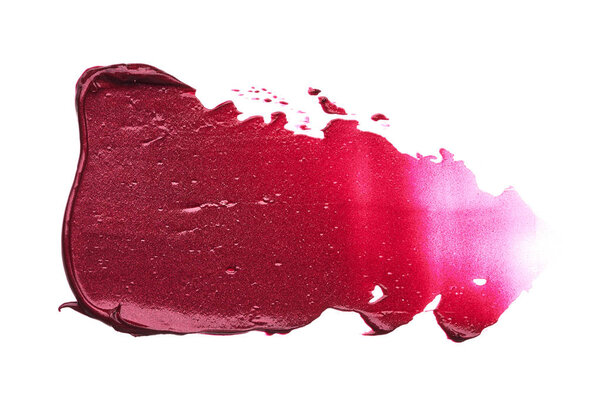 Red makeup smear of matte lip gloss isolated on white background. Red creamy lipstick texture isolated on white background