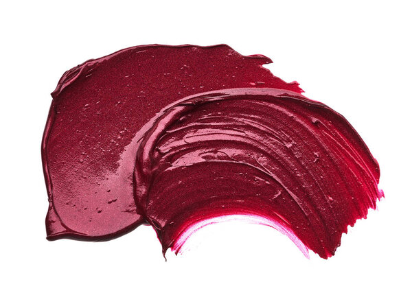 Red makeup smear of matte lip gloss isolated on white background. Red creamy lipstick texture isolated on white background