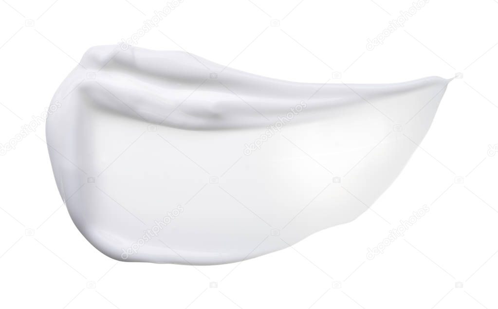 White smear of cosmetic cream isolated on white background. Creamy foundation texture isolated. Smear of white face cream isolated. Texture of cream