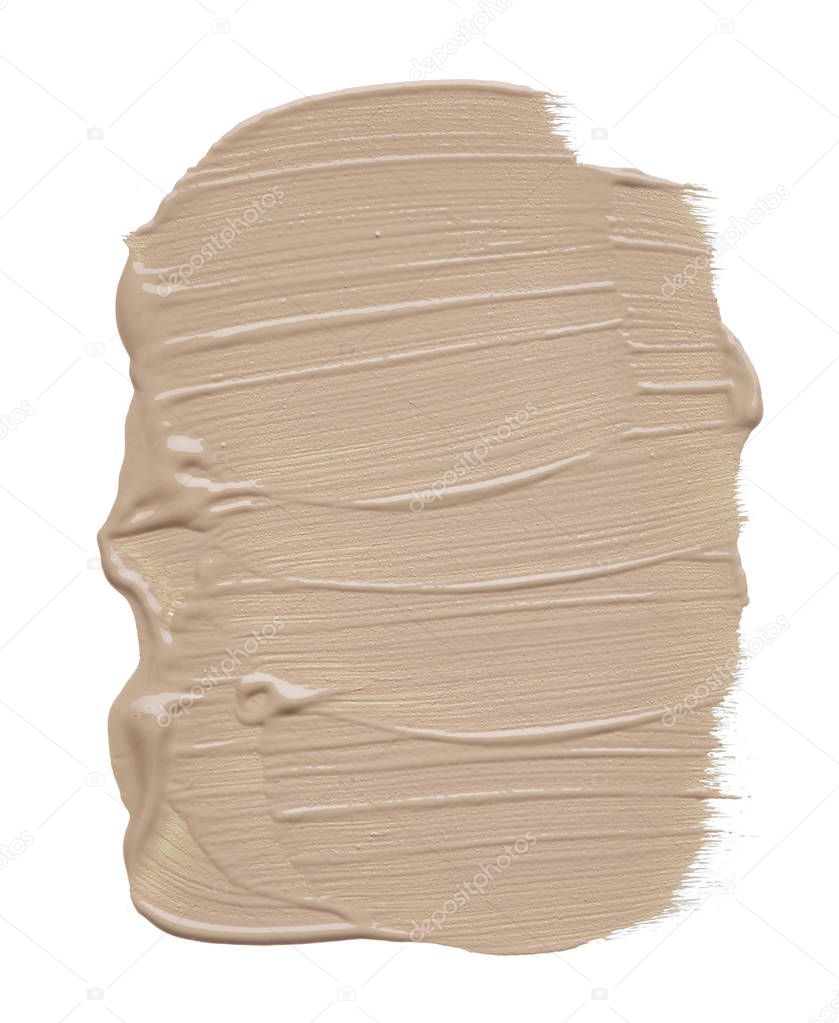 Light beige makeup smear of creamy foundation isolated on white background. Light beige creamy foundation texture isolated on white background