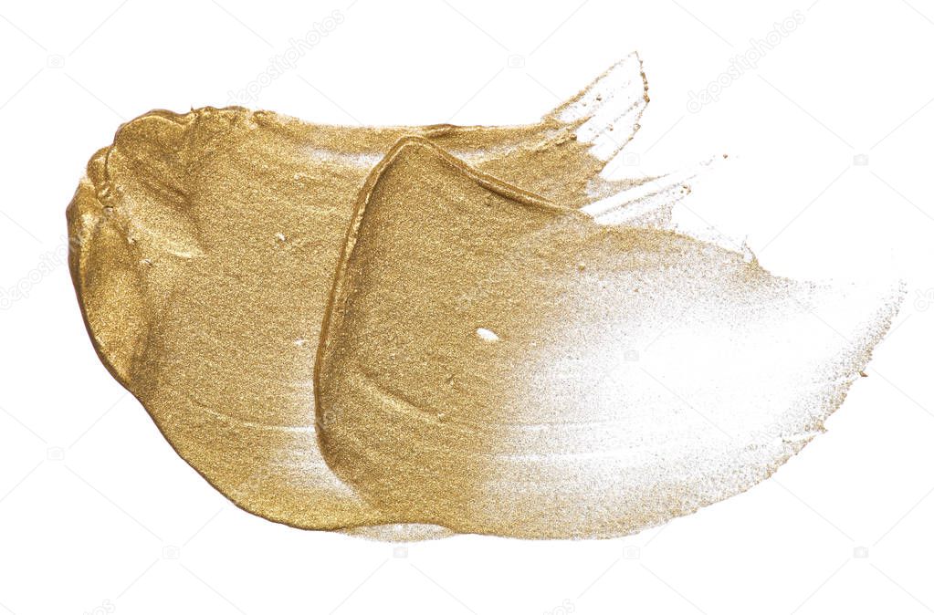 Light beige makeup smear of creamy foundation isolated on white background. Golden creamy lipgloss texture on white background