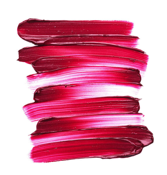 Dark red smear of matte lip gloss isolated on white background. Red creamy lipstick texture isolated on white background