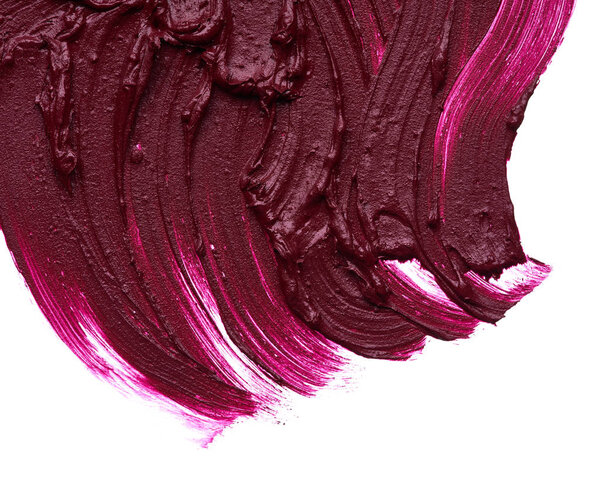 Dark red smear of matte lip gloss isolated on white background. Red creamy lipstick texture isolated on white background