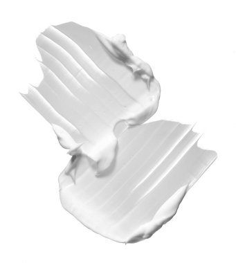 Beyaz smear kozmetik krem beyaz arka plan üzerinde izole. Beyaz arka plan üzerinde izole beyaz kremalı Vakfı doku